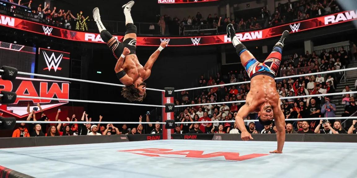 Exciting live WWE Raw match with wrestlers performing signature moves under vibrant arena lights, showcasing the thrilling atmosphere of professional wrestling.
